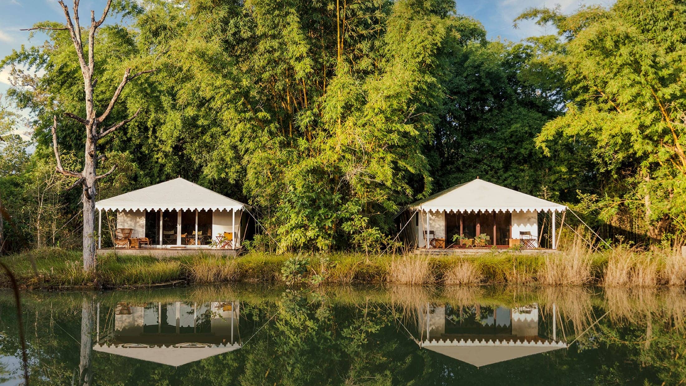 Tented villas mirrored in water