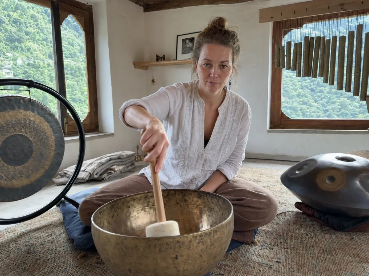 A energy practitioner leading a real online session